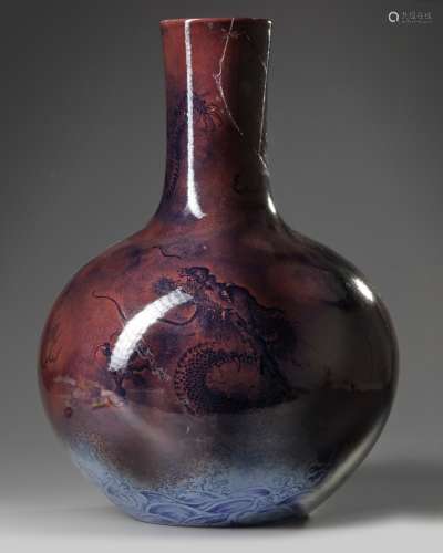 A Chinese copper-red ground blue and white 'dragon' vase, tianqiuping