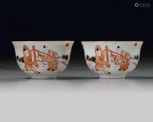 A pair of Chinese iron-red-decorated 'boys' cups