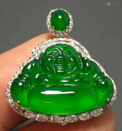 A GREEN JADEITE CARVED BUDDHA PENDANT, A CLASS