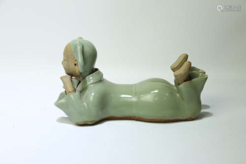 A Chinese Celadon Porcelain Figure of Boy