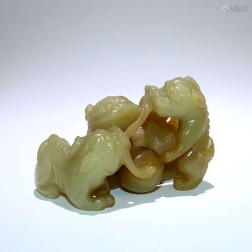 A Chinese Carved Yellow Jade Foo-Dog