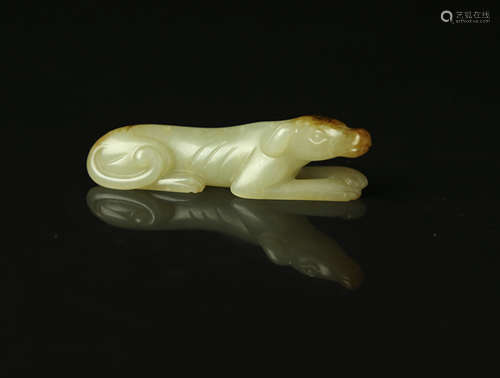 A Chinese Carved Jade Foo-Dog