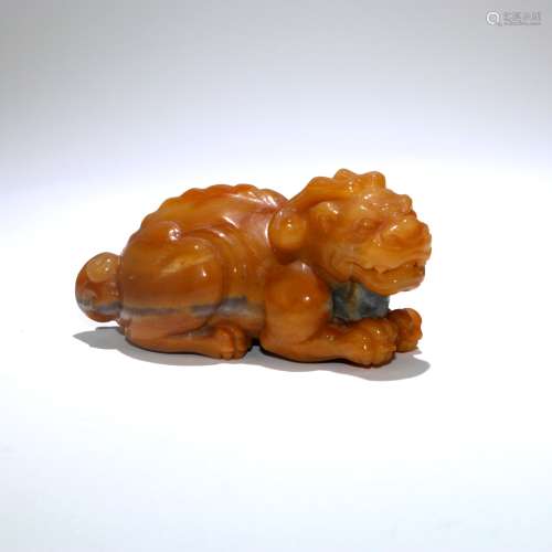 A Chinese Carved Yellow Jade Foo-Dog