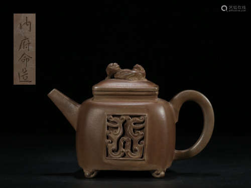 A ZISHA CARVED HOLLOW PATTERN TEA POT