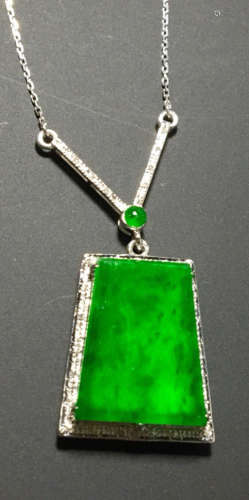A GREEN JADEITE CARVED SQUARE NECKLACE, A CLASS
