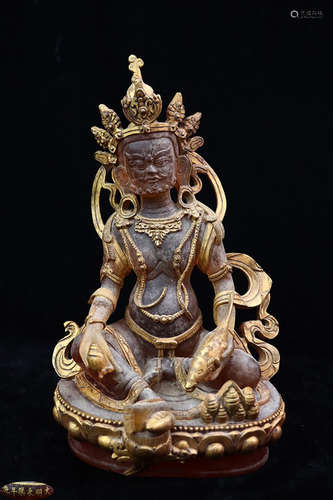 A GLASS CASTED GILT WEALTH BUDDHA