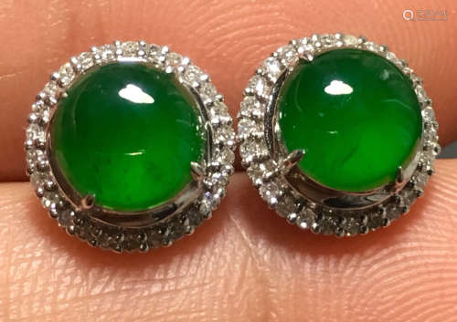 PAIR GREEN JADEITE CARVED CIRCLE EARRINGS, A CLASS
