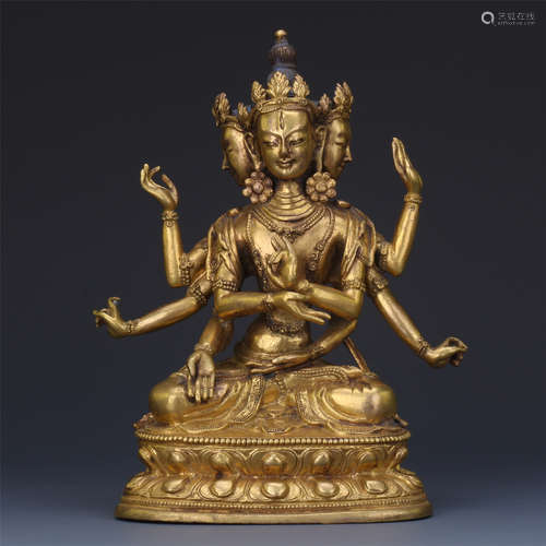 CHINESE GILT BRONZE SEATED SIX ARM GUANYIN