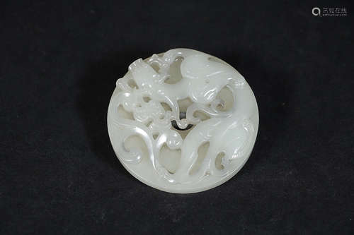 A DRAGON DESIGN HETIAN JADE PENDANT