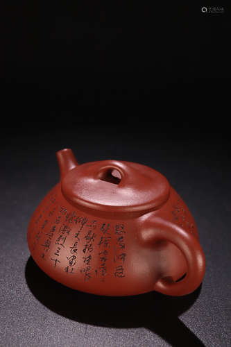 A POEM PATTERN PURPLE CLAY TEAPOT