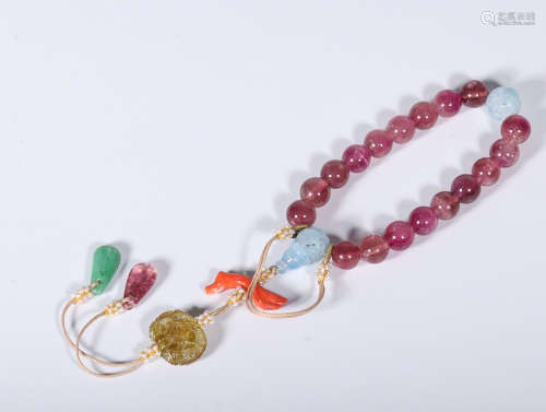 AN OLD RED TOURMALINE ROSARY