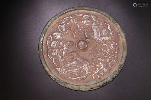 AN OLD PHOENIX PATTERN BRONZE MIRROR