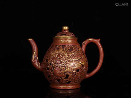 AN OLD LION PATTERN PURPLE CLAY TEAPOT