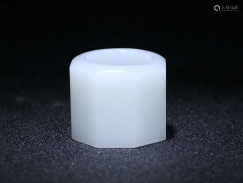 AN EIGHT-SIDE WHITE JADE THUMB RING