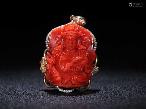 A RED CORAL PENDANT WITH 18K GOLD