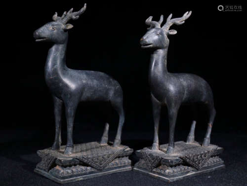 A PAIR OF BRONZE ORNAMENTS OF DEER SHAPED