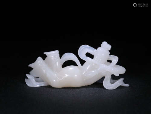 A JADE FIGURE SHAPED ORNAMENT