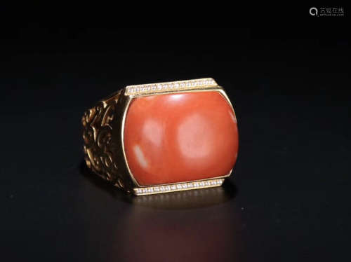 A MOMO RED CORAL RING WITH 18K GOLD
