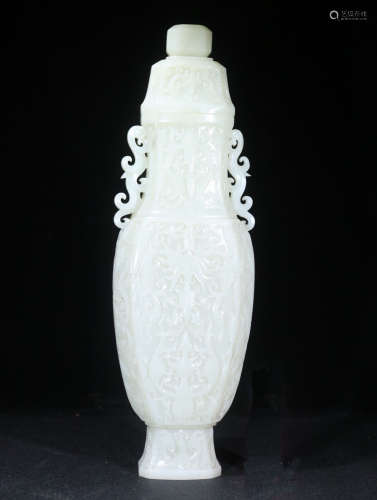 A HETIAN JADE VASE WITH FLORAL PATTERN