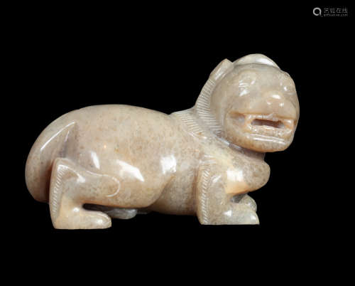 A JADE ORNAMENT IN LION SHAPE