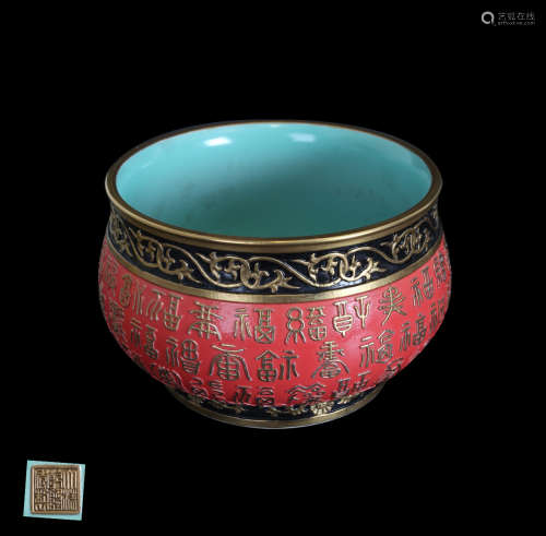 A CORAL RED GLAZED BOWL IN GOLD-painted design