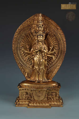 A XUANDE MARK GILT BRONZE GUANYIN STANDING ORNAMENT