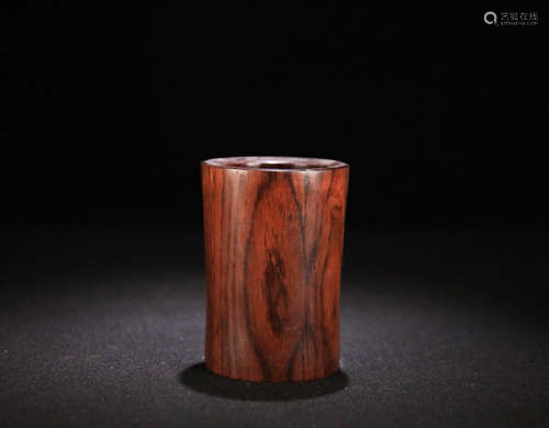 A HUANGHUALI WOOD PEN HOLDER PENDANT