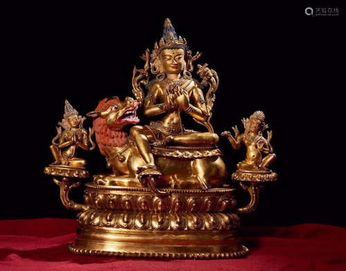 A GOLD GILT MANJUSHIRI BUDDHA