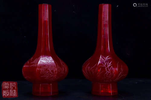 A PAIR OF GLASS VASES WITH MARKING