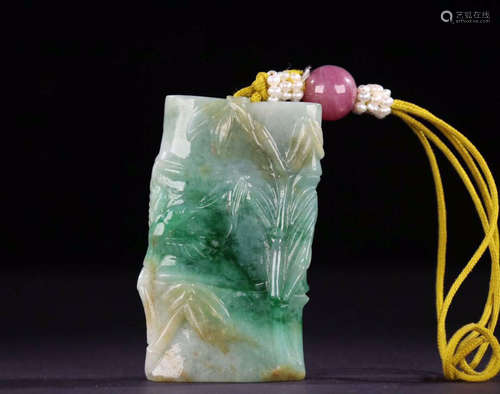 A JADEITE PENDANT OF BAMBOO SHAPED