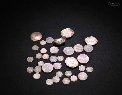 A SET OF SILVER COINS