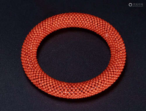 A RED CORAL BANGLE