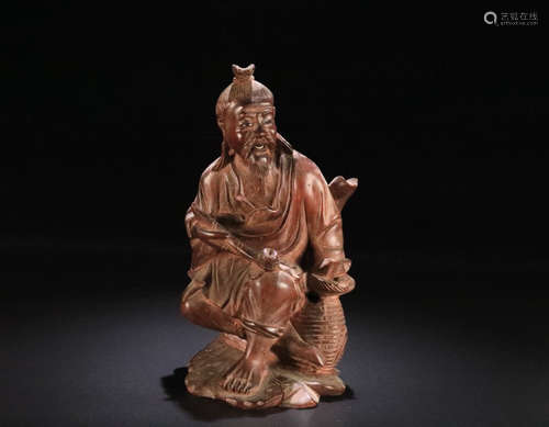 A HUANGYANG WOOD CHARACTER SHAPED ORNAMENT