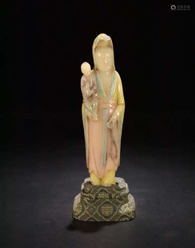 A SOAPSTONE GUANYINSONGZI BUDDHA ORNAMENT