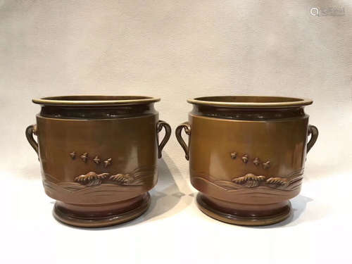 A PAIR OF BRONZE BOWLS OF LANDSCAPE PATTERN CARVED