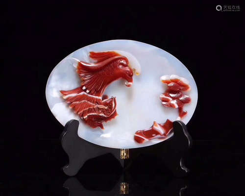 A WHITE AND RED AGATE BEAST CARVED PLATE