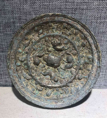 A TANG DYNASTY BRONZE MIRROR