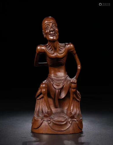 A HUANGYANG WOOD CARVED FIGURE PATTERN BUDDHA