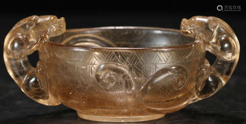 A CRYSTAL CARVED DRAGON PATTERN CUP