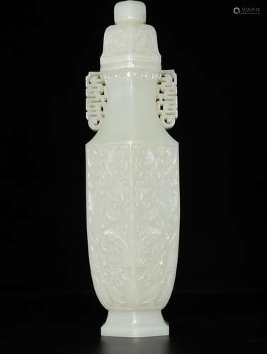 A HETIAN JADE CARVED FLOWER PATTERN VASE