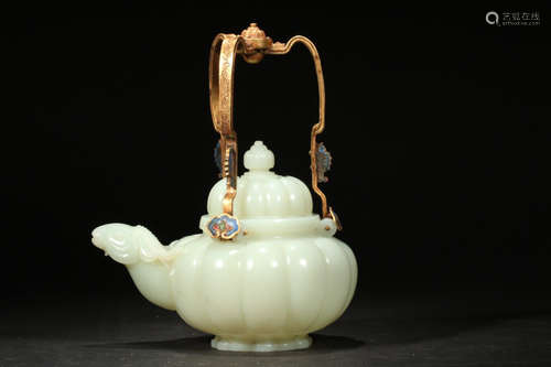 A HETIAN JADE CARVED MELON SHAPED TEA POT