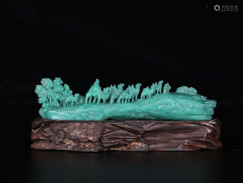 A SOAPSTONE CARVED LANDSCAPE SHAPED PENDANT