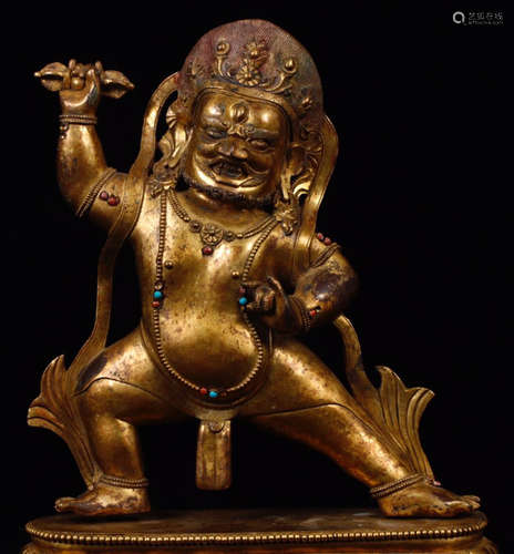 A GILT BRONZE IMMOBLIE KING BUDDHA