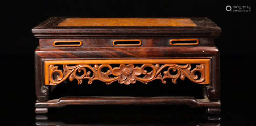 A ZITAN WOOD CARVED WRAPPED FLOWER PATTERN STAGE