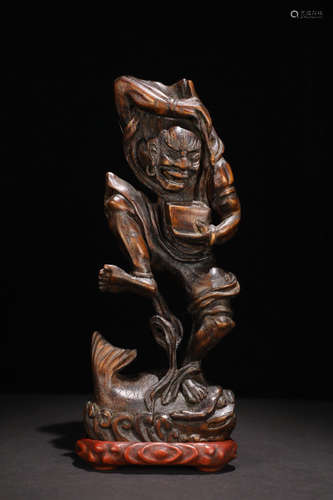 A CHENXIANG WOOD CARVED FIGURE SHAPED PENDANT