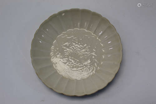 A Ding ware small dish with fish decoration.