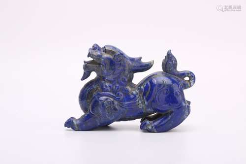 Chinese carved lapis lazuli lion.