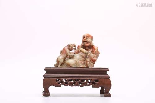 Chinese carved soapstone figure.