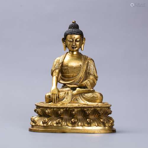 Chinese gilt bronze figure of Buddha.