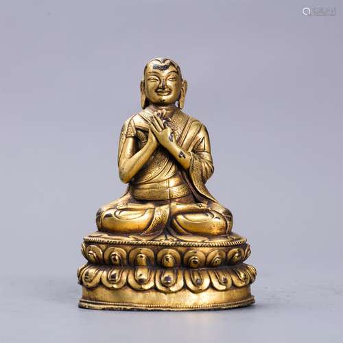 Chinese gilt bronze figure of Buddha.